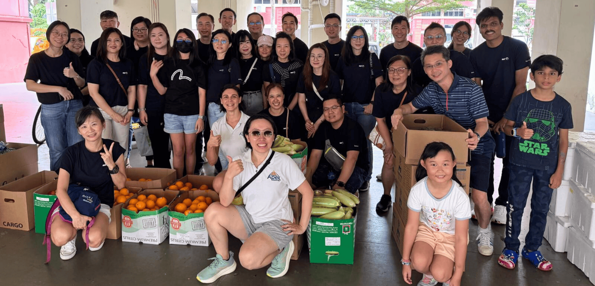 AET teams up with Apex Club in Singapore for community food drive group photo