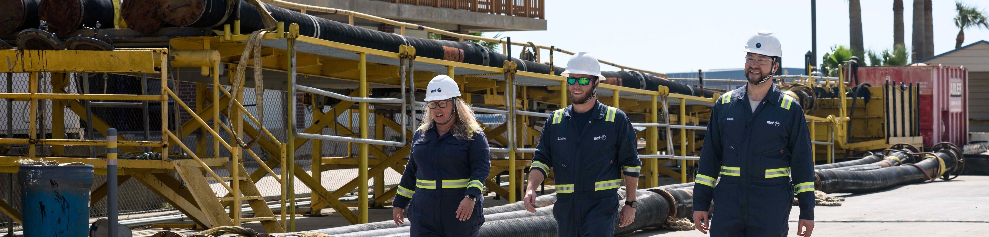 AET staff walking at AET Offshore in Galveston